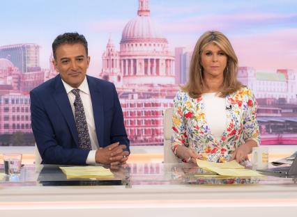 Adil Ray and Kate Garraway presenting the Good Morning Britain TV show.