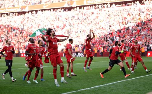 Liverpool players celebrating their Premier League victory.