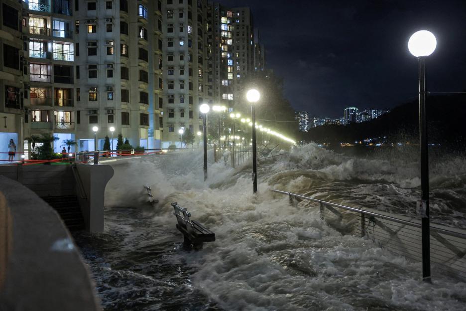 World’s BIGGEST super typhoon this year slams into Hong Kong & washes pair out to sea while lake bursts in Taiwan