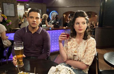 Still image from Coronation Street showing Jason Grimshaw and Rosie Webster on an uncomfortable date.