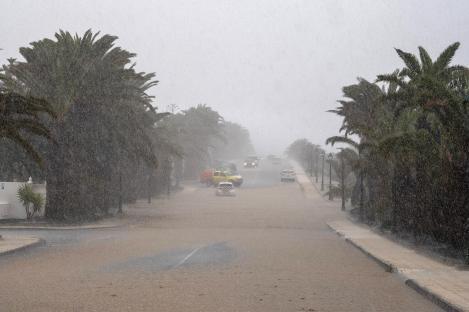 Flooded street in Teguise, Lanzarote during heavy rain.