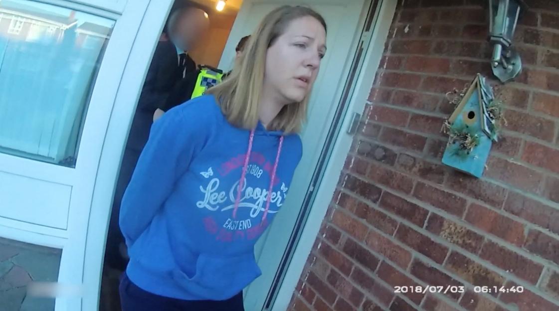 Police arresting Lucy Letby at her home.