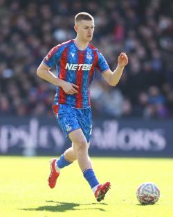 Adam Wharton of Crystal Palace in action during a soccer match.