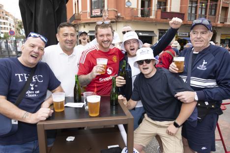 Tottenham Hotspur and Manchester United fans celebrating in Bilbao.