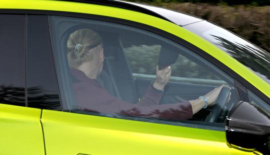 Erling Haaland in a lime green car.