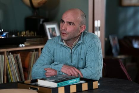 Still image of Roland Manookian as Teddy Mitchell in EastEnders.