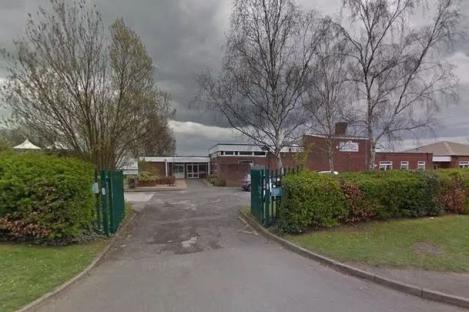Schools plunged into lockdown as armed cops hunt ‘man with machete’ roaming streets – as suspect, 34, arrested