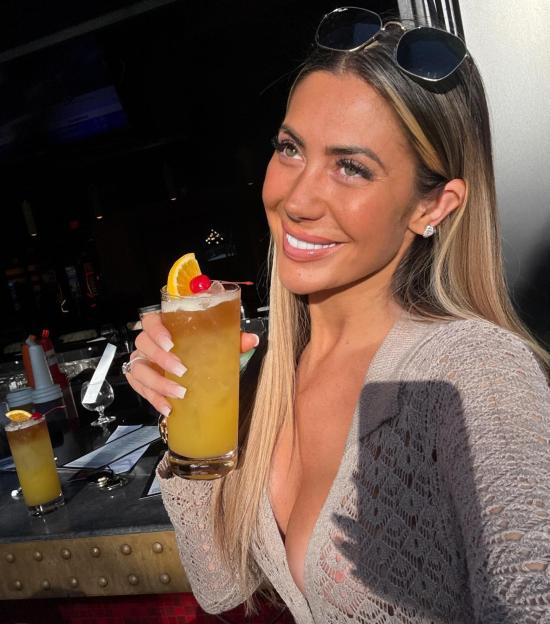Woman holding a Mai Tai in Las Vegas.