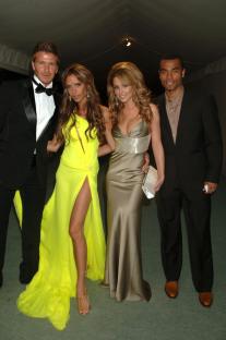 David and Victoria Beckham with Cheryl Tweedy and Ashley Cole at a party.