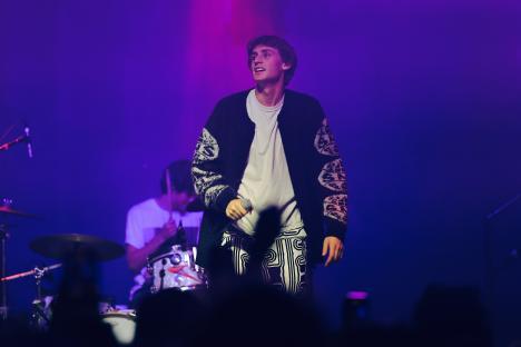 Magnus Paulin Ferrell performing onstage at a concert.