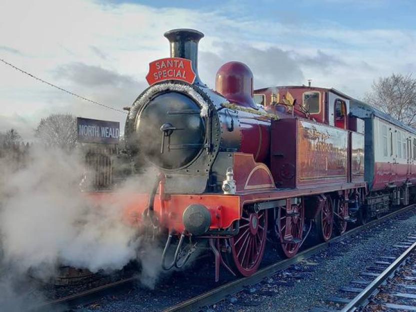 Epping Ongar Railway Santa Special train, red and black, at North Weald.
