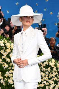 Zendaya in a white suit and hat at the Met Gala.