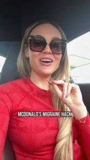 Woman in a red shirt describing a McDonald's migraine hack.