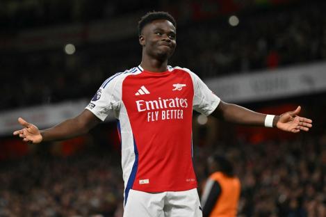 Bukayo Saka celebrating a goal.