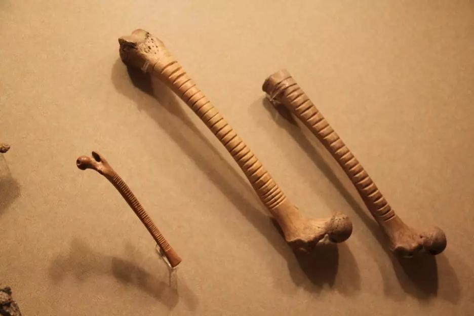 Three carved bone musical instruments from pre-Hispanic Mexico.