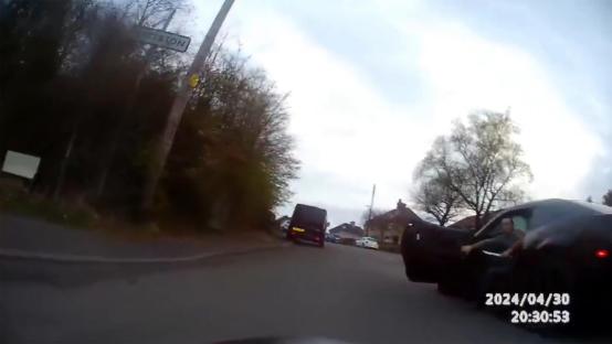 Dashcam footage of a road rage incident.
