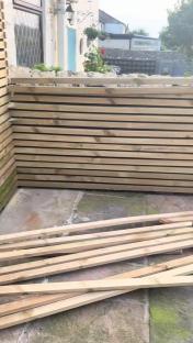 Six-foot-high wooden fence destroyed.