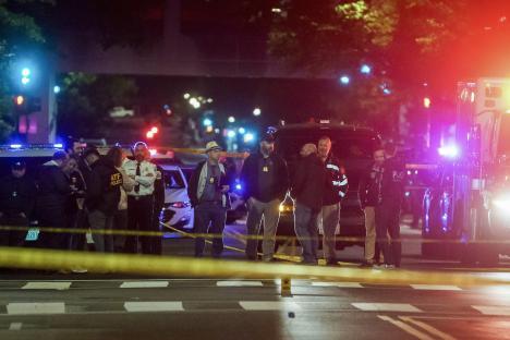 Police officers at a crime scene near the Capital Jewish Museum in Washington, D.C.