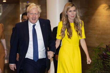 Boris Johnson and Carrie Johnson arrive at the Commonwealth Heads of Government Meeting.