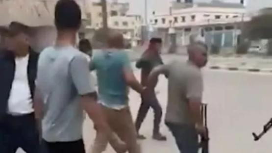 Watch as Hamas gunman is EXECUTED by family of man he shot dead – as terrorists lose grip on Gaza & Israel marches in