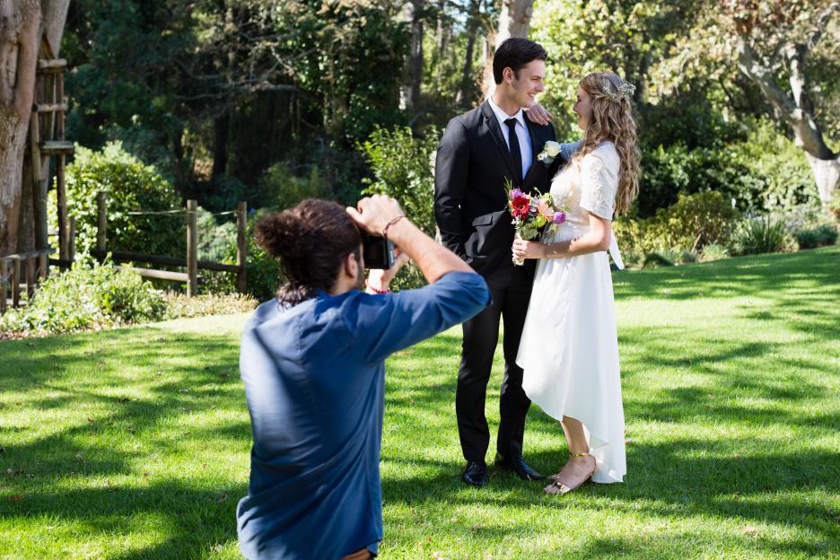 Bride Outraged After Wedding Photos Ruined by Officiant's BRA and Strange Themed Outfit