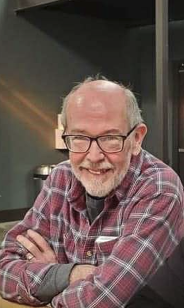 Jim Dougherty smiling.