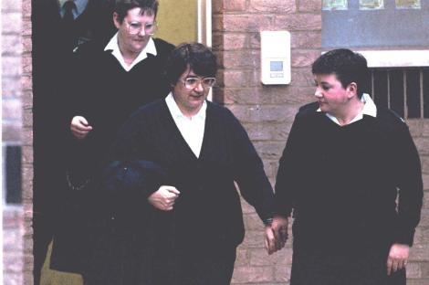 Rosemary West escorted by prison officers at Gloucester Magistrates Court.