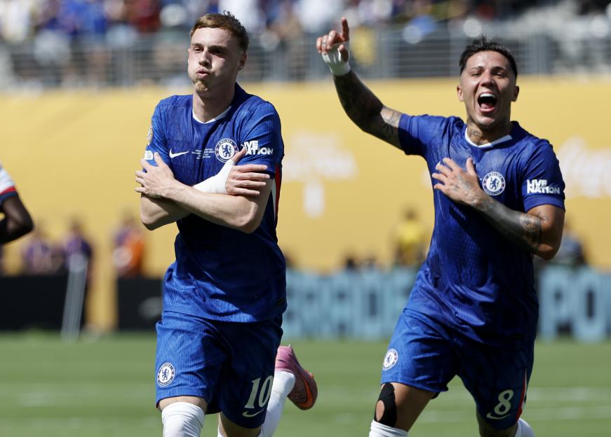 Cole Palmer and Enzo Fernandez of Chelsea celebrate a goal.