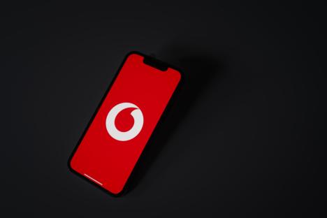 Vodafone logo on a mobile phone screen.
