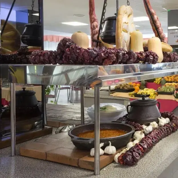 Buffet with various dishes and ingredients.