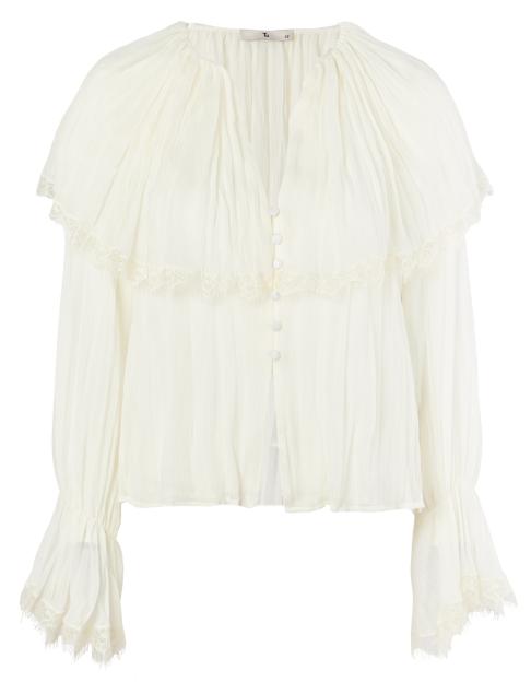 Off-white blouse with lace trim and button front.