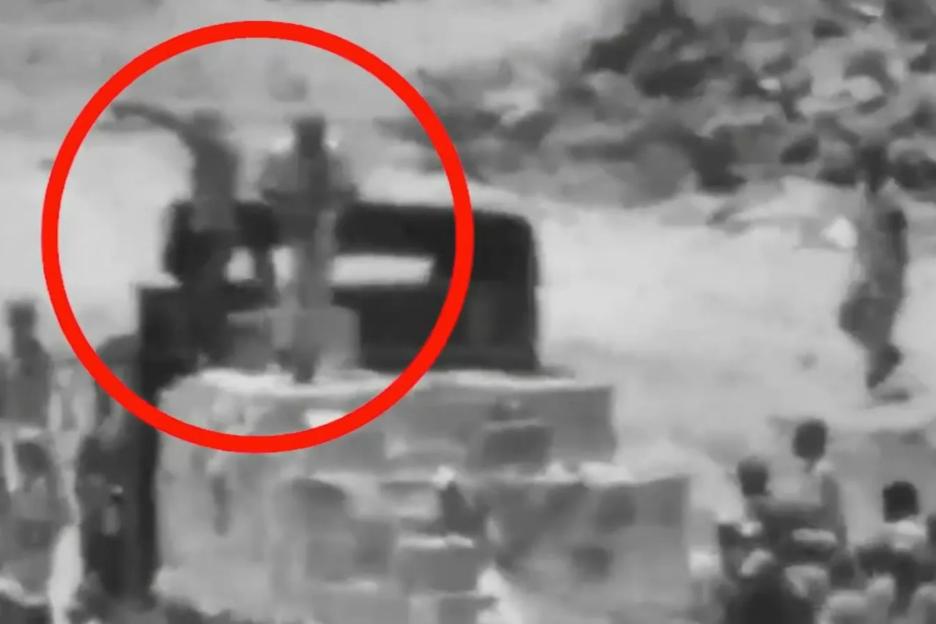 Shock moment gun-toting terrorists loot Gaza aid truck as 22 Arab states urge Hamas to SURRENDER in unprecedented plea