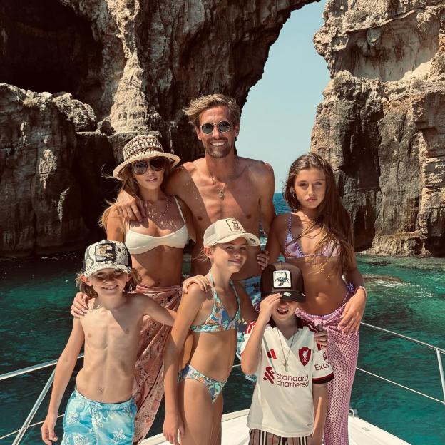 Abbey Clancy looks incredible as she strips to a bikini on family holiday with husband Peter Crouch and their four kids