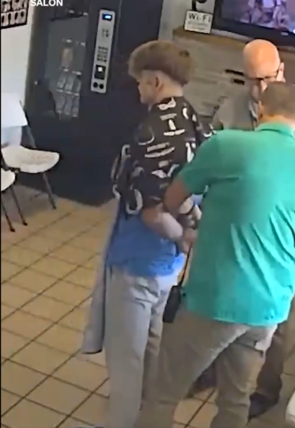 Arrest of a suspect in a hair salon.