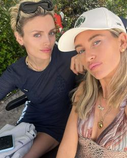 Charley Webb and a friend posing for a selfie.