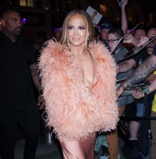 Jennifer Lopez arriving at a birthday celebration.