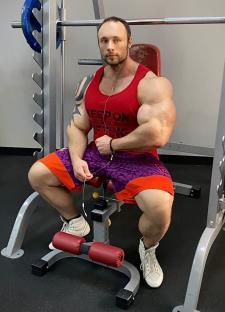 Bodybuilder Nikita Tkachuk at the gym.