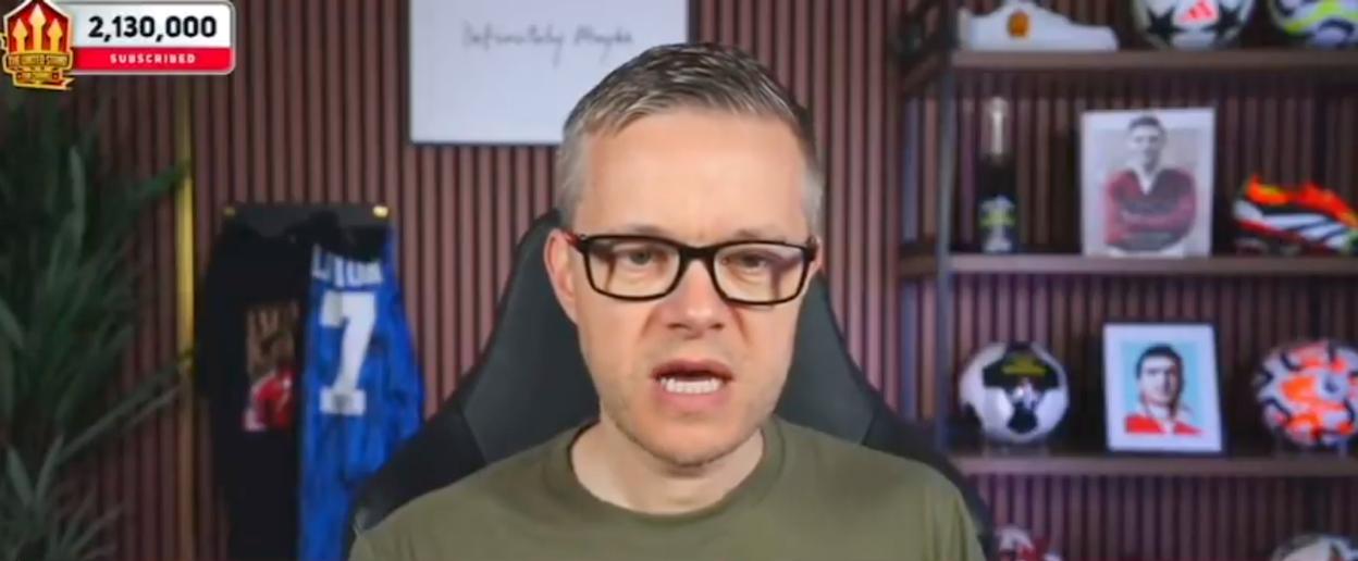 Screenshot of a man speaking to the camera.