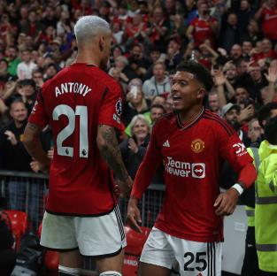 Jadon Sancho and Antony of Manchester United celebrating a goal.
