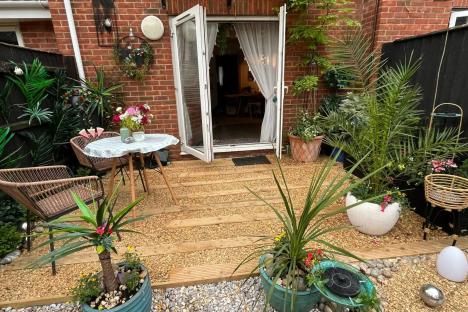 I got a gorgeous garden on a budget with a £6 Wickes buy – my ugly concrete slabs are gone, now my sun trap is stunning
