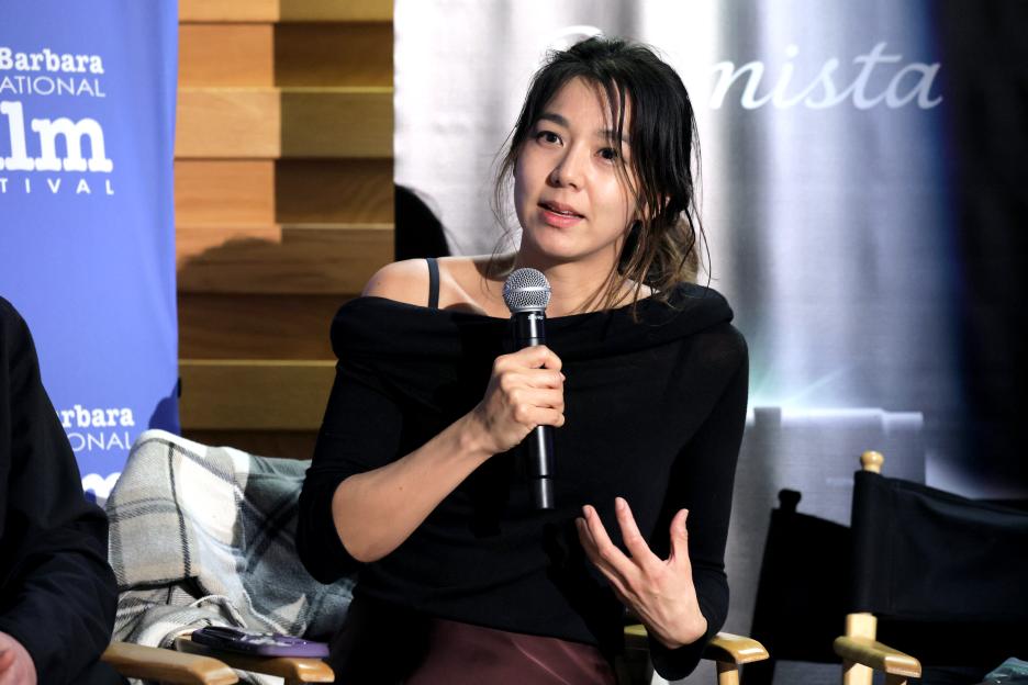 Elizabeth Lo speaking at a seminar.