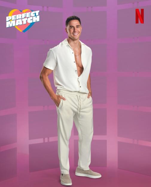 Freddie Powell from Perfect Match posing in a cream-colored shirt and pants.