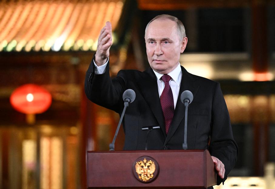 Vladimir Putin at a press conference in Beijing.