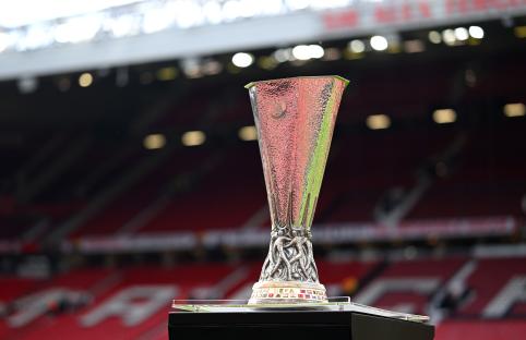 UEFA Europa League trophy in a stadium.