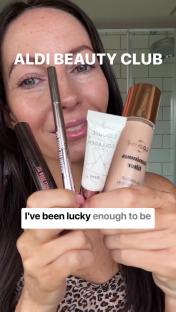 Person holding Aldi beauty products.