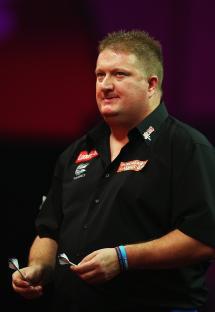 Colin Lloyd of Great Britain at the 2014 World Darts Championship.
