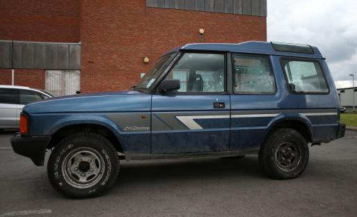 Blue Land Rover Discovery.