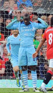  Mario Balotelli wore a special T-shirt after setting off fireworks in his bathroom before the Manchester derby