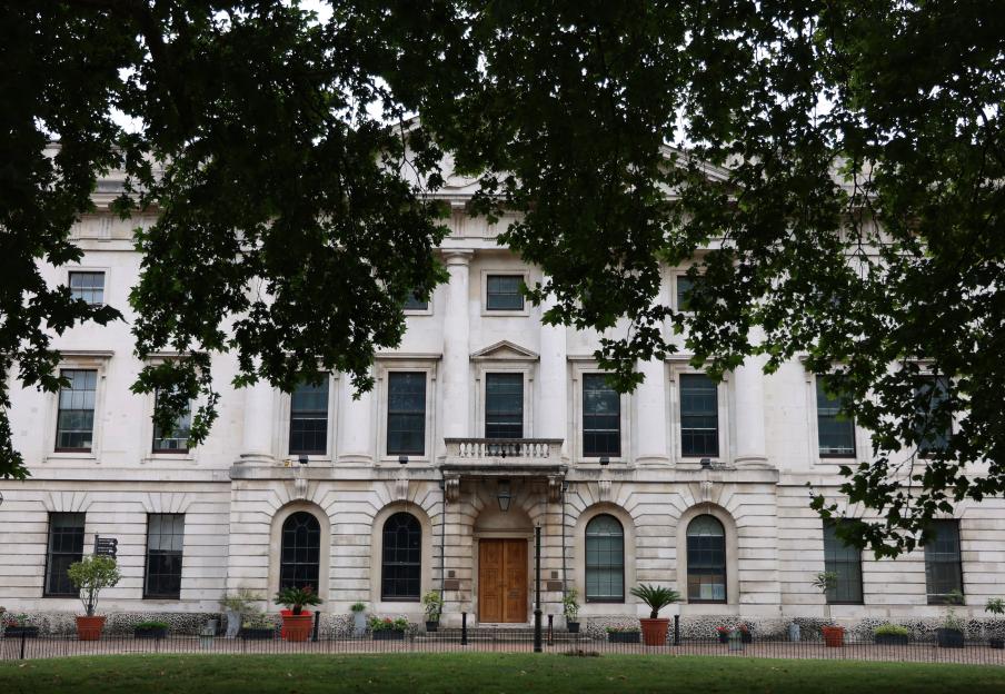 The proposed new Chinese embassy in London, partially obscured by trees.