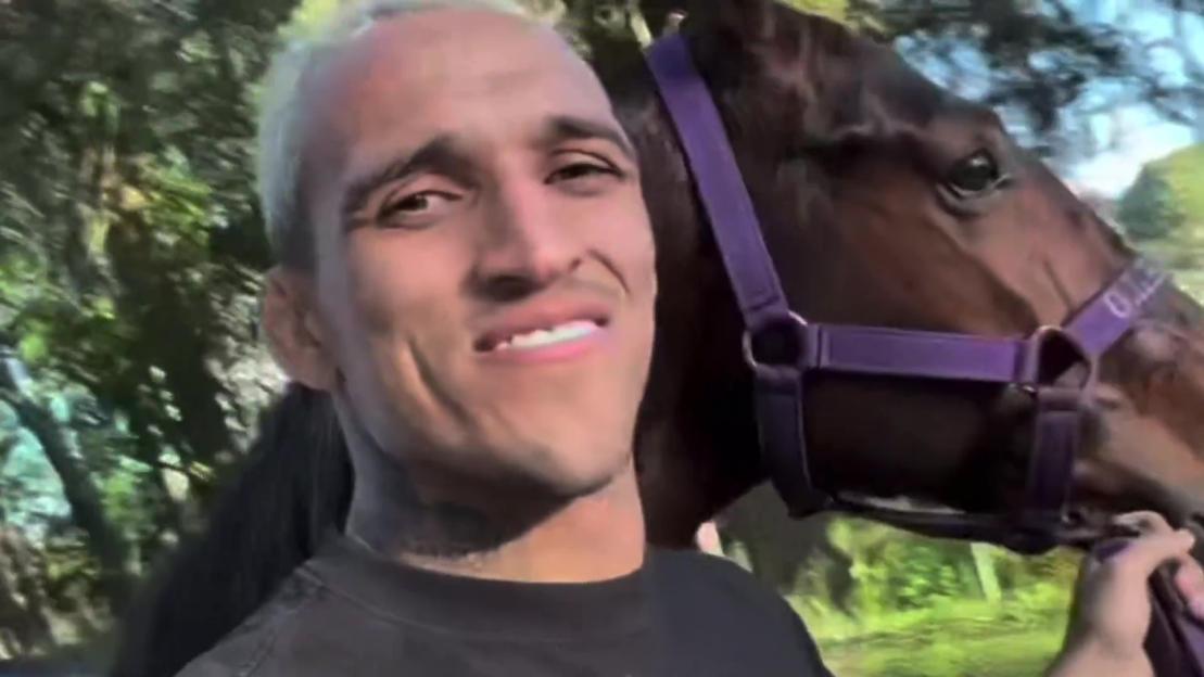 Charles Oliveira with his horse